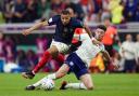 England's Declan Rice challenges French rival Kylian Mbappe during their World Cup quarter-final