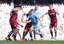 Manchester City'sPhil Foden attacks against West Ham United