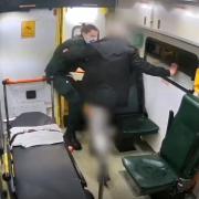 A medic was pushed out the back of an ambulance by an abusive patient in November
