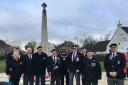Mayor of Barking and Dagenham Cllr Peter Chand with veterans at the Dagenham Village war memorial. Picture: Angharad Carrick