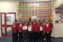 Leys Primary School's wellbeing champions with the award. Picture: Angharad Carrick