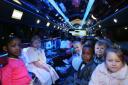 BossCrowns students inside the limo