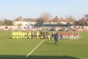 West Ham Women and Huddersfield Town Ladies line up before play