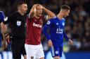 West Ham United's Mark Noble reacts after being shown a red card by referee Michael Oliver during the Premier League match at The King Power Stadium, Leicester.