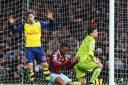 Barclays Premier League match: West Ham United 1 Arsenal 2. West Ham Diafra Sakho, centre, reacts as he misses a goal opportunity