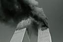 Smoke billows from the World Trade Center, on Tuesday, September 11, 2001 when terrorists crashed two airliners into the twin 110-story towers.