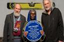 L-R: Lloyd Jeans, Neandra Etienne and Paul Romane with the Newham Heritage plaque commemorating the location of the Upper Cut Club in Forest Gate where Jimi Hendrix wrote Purple Haze.