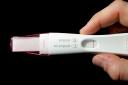 A home pregnancy test, and its instructions. Picture: DOMINIC LIPINSKI