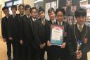 The winning St Bonaventure's pupils with their certificate. Picture: Di Halliwell