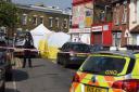 Police and a forensic team investigate a shootout in Bective Road, Forest Gate. Picture: Ken Mears