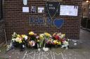Floral tributes for Karim Samms who was shot and killed in North Woolwich