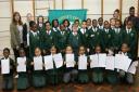 Pupils from St. Anthony's school with the letters they sent on to Nando's