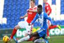 On the ball for Colchester United, Blair Turgott in the match against Crewe Alexandra. Picture: GREGG BROWN