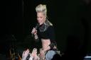 Pink on stage at the LG Arena, Birmingham in 2013
