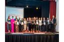 Winners of accolades at the Newham Business Awards 2022 gather on stage