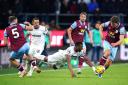 West Ham's Mohammed Kudus battles for the ball at Burnley