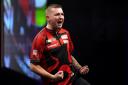 Nathan Aspinall won his first Premier League darts victory in Exeter (Andrew Matthews/PA)