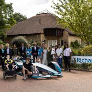 Representatives from Formula E and the ExCeL visited Richard House along with the racing car