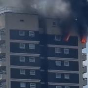 Fifteen fire engines and around 125 firefighters are tackling a flat fire on Manwood Street in North Woolwich