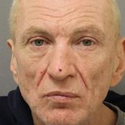 Andy Koseda, 54, of no fixed address, was jailed after threatening someone with a knife and carving swastikas into walls in Stratford