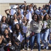 Pupils celebrate at Brampton Manor Academy as they receive their A Level results.