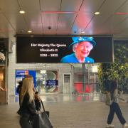 Tributes to the Queen, like this one at Westfield Shopping Centre in Stratford, have been erected across London