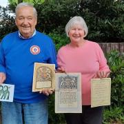 Terry Morris and his wife, Maureen, with memorabilia from the Queen's 1953 coronation