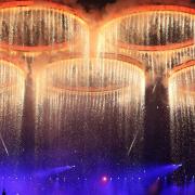 The Olympic rings come together in formation during the London Olympic Games 2012 opening ceremony