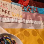 Queer young people from Newham contributed to a flag-stitching project aimed at opening up conversations around the Progress Pride flag