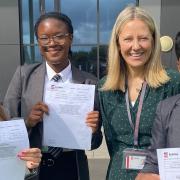 Eastlea headteacher Sarah Morgan with pupils celebrating their grades on GCSE results day.