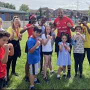 Ex boxing champion Wadi Camacho helps out at Calverton school sports day