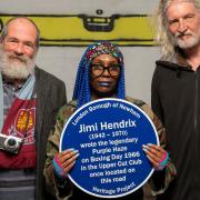 L-R: Lloyd Jeans, Neandra Etienne and Paul Romane with the Newham Heritage plaque commemorating the location of the Upper Cut Club in Forest Gate where Jimi Hendrix wrote Purple Haze.