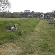 An existing mounded area at Manor Park Cemetery, created by previous reclamation work to make space for more plots on top.