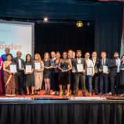 Winners of accolades at the Newham Business Awards 2022 gather on stage