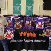 Neo Jain Naha and brother Rico handed around 450 advent calendars to the appeal