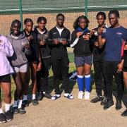 Newham pupils with their medals.
