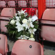 A wreath is left in the East Stand in memory of Orient fan Derek Reynolds