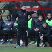 Leyton Orient boss Richie Wellens gives instructions