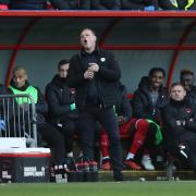 Leyton Orient head coach Richie Wellens reacts in the dugout