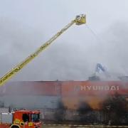 It took firefighters near four hours to bring the fire under control with black smoke spreading in the surroundings