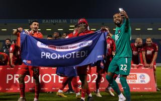 Leyton Orient players celebrate promotion to League One