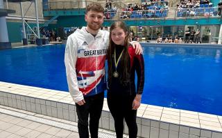 Dive London's Millie Rowell faces the camera with Olympic gold medalist Matty Lee